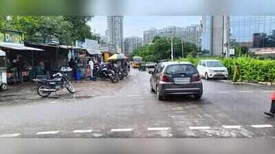 Illegal parking, dhabas and garages choke access to Emerald Floors Premier in Gurgaon
