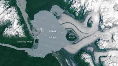<b>A new island has emerged in Alaska after a glacier melted away: Nasa images reveal a stark sign of climate change</b>