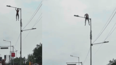 'Want to meet Suvendu-babu': Bengal man climbs lamp post, performs pull-ups, stunts for 40 minutes
