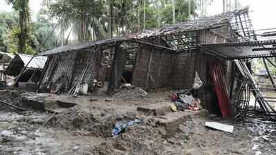 Terrified villagers cling to life on trees & rooftops, rescue teams brave trobled waters for the save