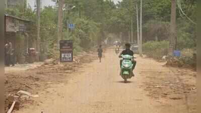 One month on, dug-up road leaves 1,500 in condo struggling for access