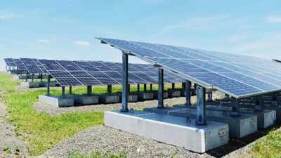New Haven turned a capped landfill into a 1,920-panel solar farm; the site now powers about 200 homes and pays the city $72,000 a year