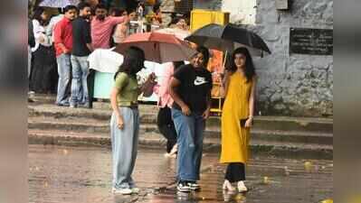 Rain fans sultry city, brings respite from humidity