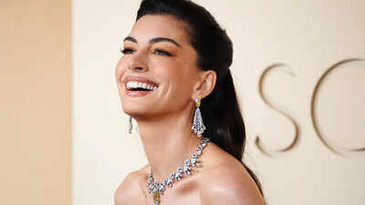 Pregnant Anne Hathaway reveals plans to keep baby’s gender hidden: 'We know, but we're not saying'