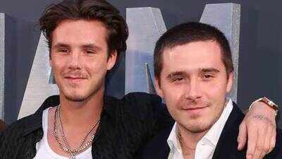 Cruz Beckham looks just like Brooklyn on family yacht as tattoos spark fresh interest amid Beckham family feud