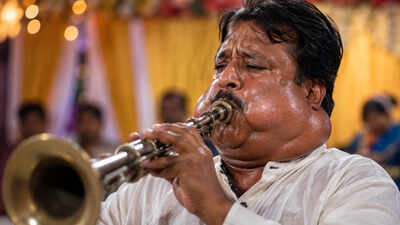 Every time he blows into the instrument, his neck balloons out: What is happening to this musician?