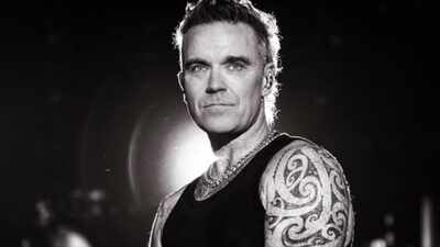 Robbie Williams says he has a ‘little bit of autism’ anad uses creativity to cope: 'It’s best to train my brain to do something better...'