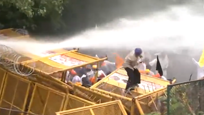 Chandigarh Police use tear gas, water cannons as march to guv's residence turns tense