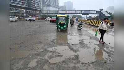 Noida roads take a battering after rain, rides turn bumpy across city