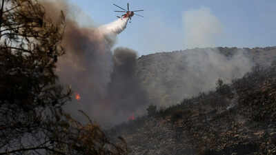 Europe wildfires: 2 dead, 500 evacuated as twin blazes hit Greek island near Athens