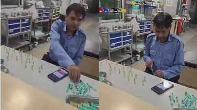 Watch: Noida hospital’s security guard caught filling syringes