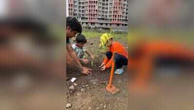 NIBM residents turn neglected garbage dump into a community green space