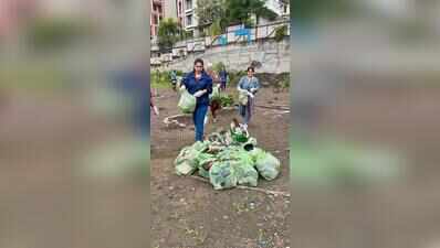 NIBM residents turn neglected garbage dump into a community green space
