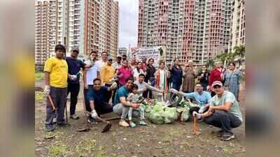 NIBM residents turn neglected garbage dump into a community green space