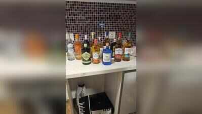 Six businessmen caught in booze party raid