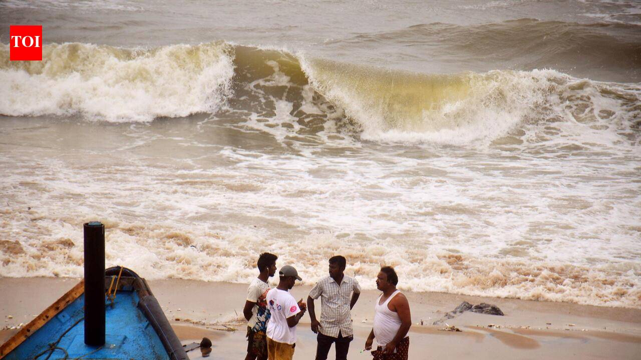 Indian Coast Guard vessel conducting a search operation at sea for a missing fishing boat off the Andhra Pradesh coast.
