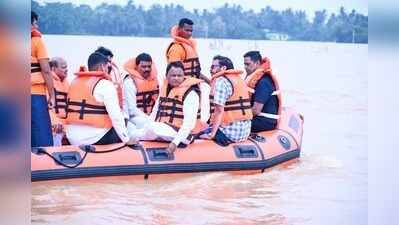 Floods affect 8L people; CM wades inundated villages to meet them