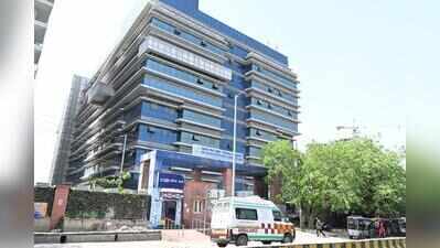 Guard fills syringes for emergency patients at district hospital