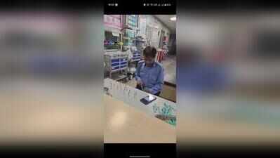 Guard fills syringes for emergency patients at district hospital