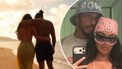 Kim Kardashian shares loved-up photos with Lewis Hamilton from summer getaway 'somewhere over the rainbow'