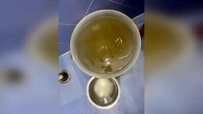 Tempers rise as muddy water runs through taps, drains choked