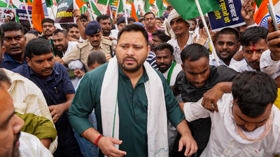 Bihar: Water cannon used as RJD leaders march to Raj Bhavan; Tejashwi Yadav detained