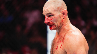 Sean Strickland turns Dustin Poirier’s viral IGBBMN phrase into a gym-wide catchphrase before painting it on his car