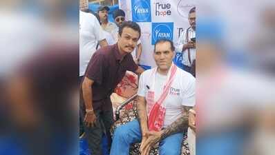 Wrestling legend Khali brings relief to Sivasagar’s flood-hit community