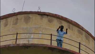 Man climbs water tank to protest playground’s poor condition in Jhunjhunu