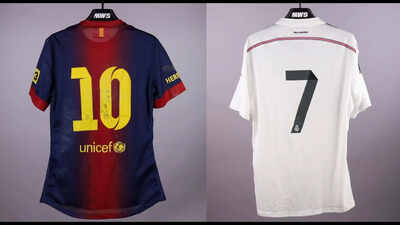 Messi and Ronaldo shirts from same collection go head-to-head at auction, with one selling for six times more