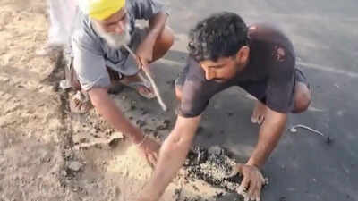 Watch: Bathinda villagers peel off newly laid road with bare hands, allege shoddy construction
