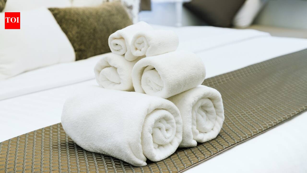 Hotel towels explained: The mystery behind that confusing stack in your bathroom | - The Times of India