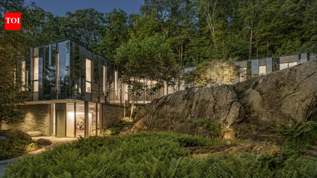 This $15 million New York home almost disappears into the forest on its 19.5-acre wooded estate