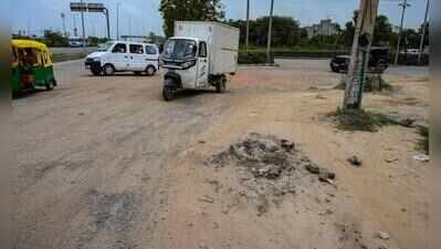 Service road near Kherki Daula toll riddled with potholes, commute a nightmare