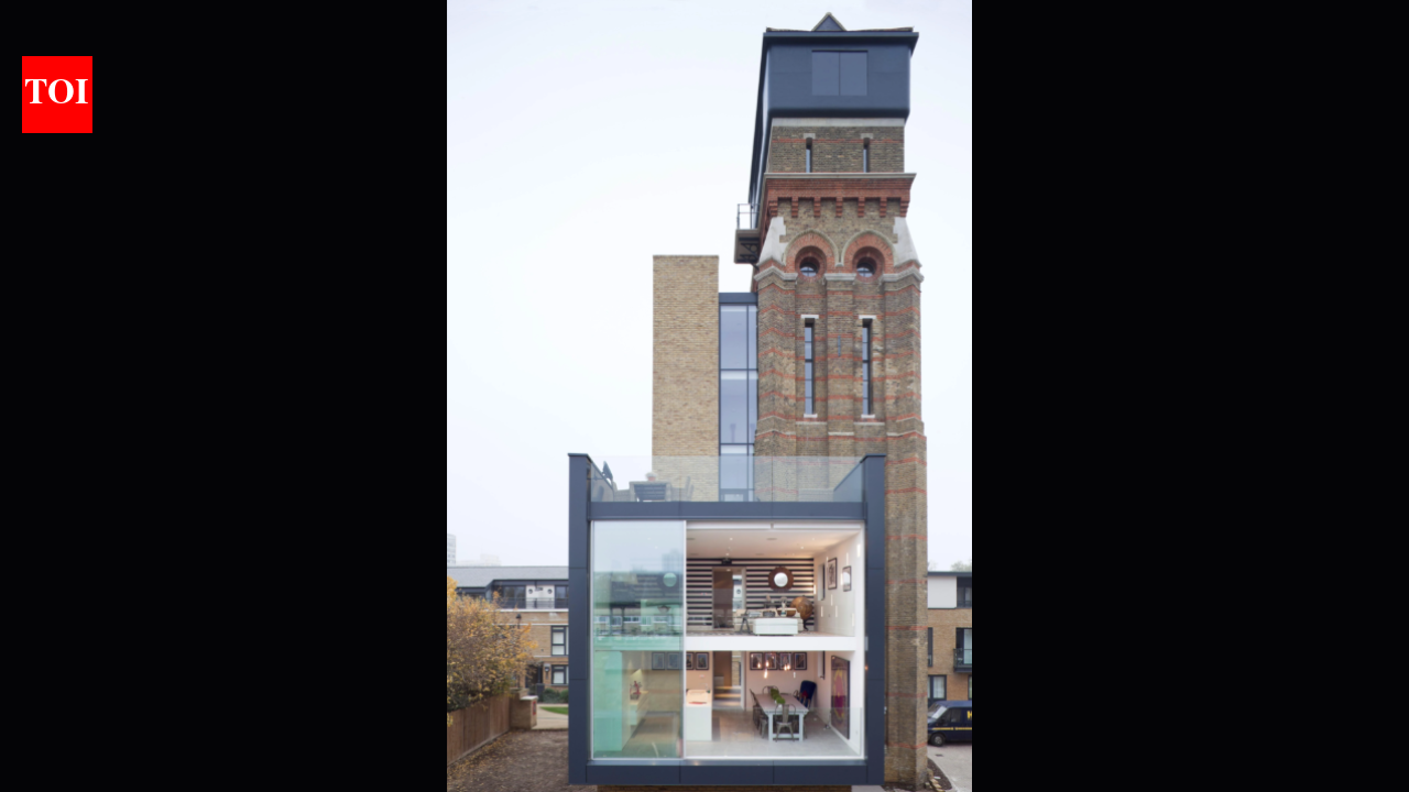 A British couple bought a derelict 85-foot, seven-storey Victorian water tower at auction