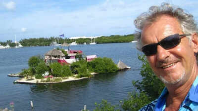 A British artist collected more than 100,000 plastic bottles and built an artificial island with a house, ponds and a waterfall