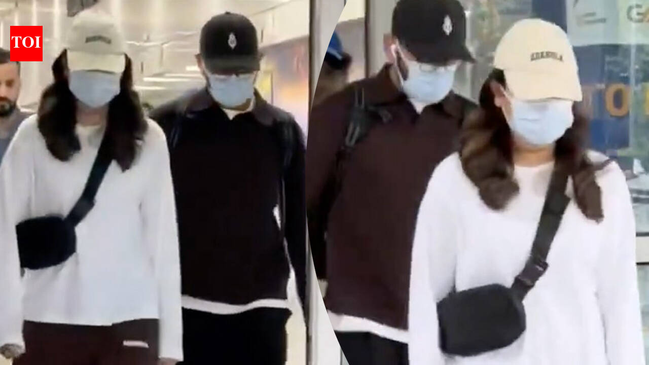 Anushka and Virat SPOTTED at Delhi Airport - WATCH