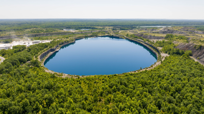 In 1993, Minnesota turned 5,000 acres of abandoned iron mines and 15 flooded pits up to 525 feet deep into Cuyuna Country; today the former mining landscape has 50+ miles of bike trails and 25 miles of shoreline