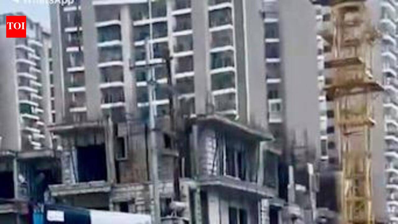 Lined with condos, even light rain floods roads here