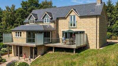 A couple built a four-bedroom home in Wiltshire for their disabled daughter in 2022, now face council demolition order after planning row over basement and Green Belt rules