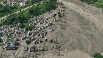 Ice-rock avalanche likely triggered Bhotekoshi flood; quake link under probe
