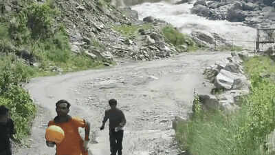 'OMG, OMG!' Villagers run for life as flash flood chases them after engulfing bridge - watch video