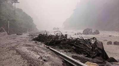 Barrier lake near Nepal border could breach in 3 days, China warns as hundreds dead in flash floods