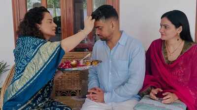 Kangana Ranaut celebrates Raksha Bandhan in a saree with teeka, aarti thali and traditional rituals after criticising Kriti Sanon’s ad and her outfit: PICS