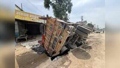 Truck falls into stormwater drain after slab gives way on Pataudi Road in Gurgaon