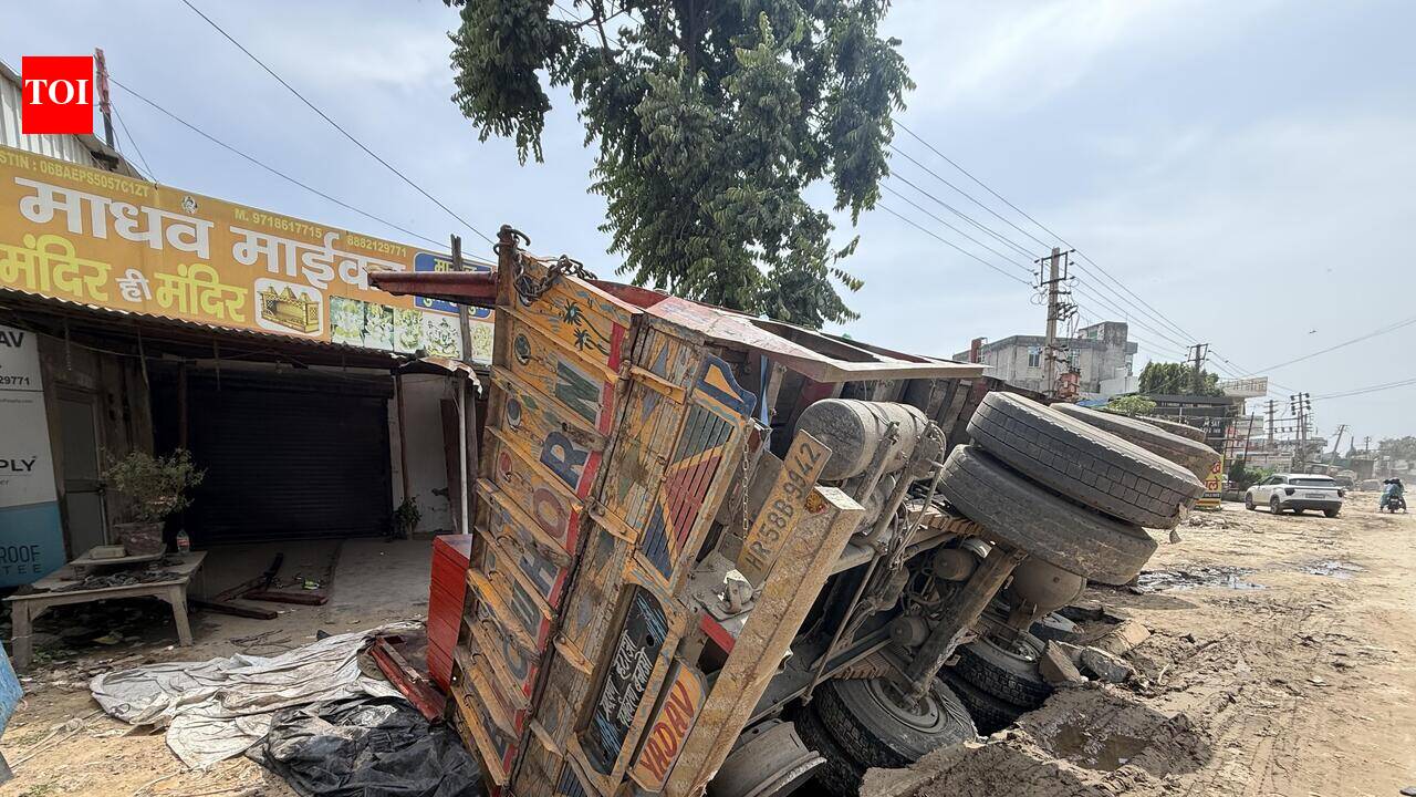 Truck falls into stormwater drain after slab gives way on Pataudi Road in Gurgaon