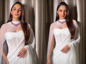 Kiara Advani looks stunning in a white chiffon saree and breathtaking 78-carat ruby necklace