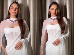 Kiara Advani looks stunning in a white chiffon saree and breathtaking 78-carat ruby necklace