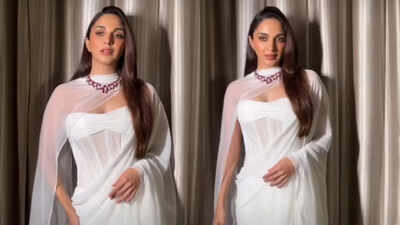 Kiara Advani looks stunning in a white chiffon saree and breathtaking 78-carat ruby necklace