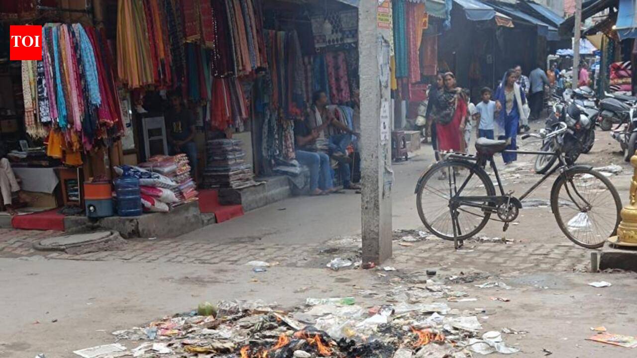 Toxic fumes from plastic waste burning choke narrow lanes of Sadar market in Gurgaon